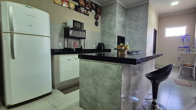 Casa com Piscina e Churrasqueira