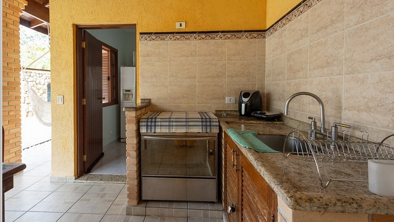 Casa com Piscina e Cascata no Morada da Praia